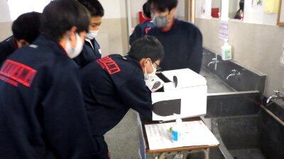 手洗いチェックの様子